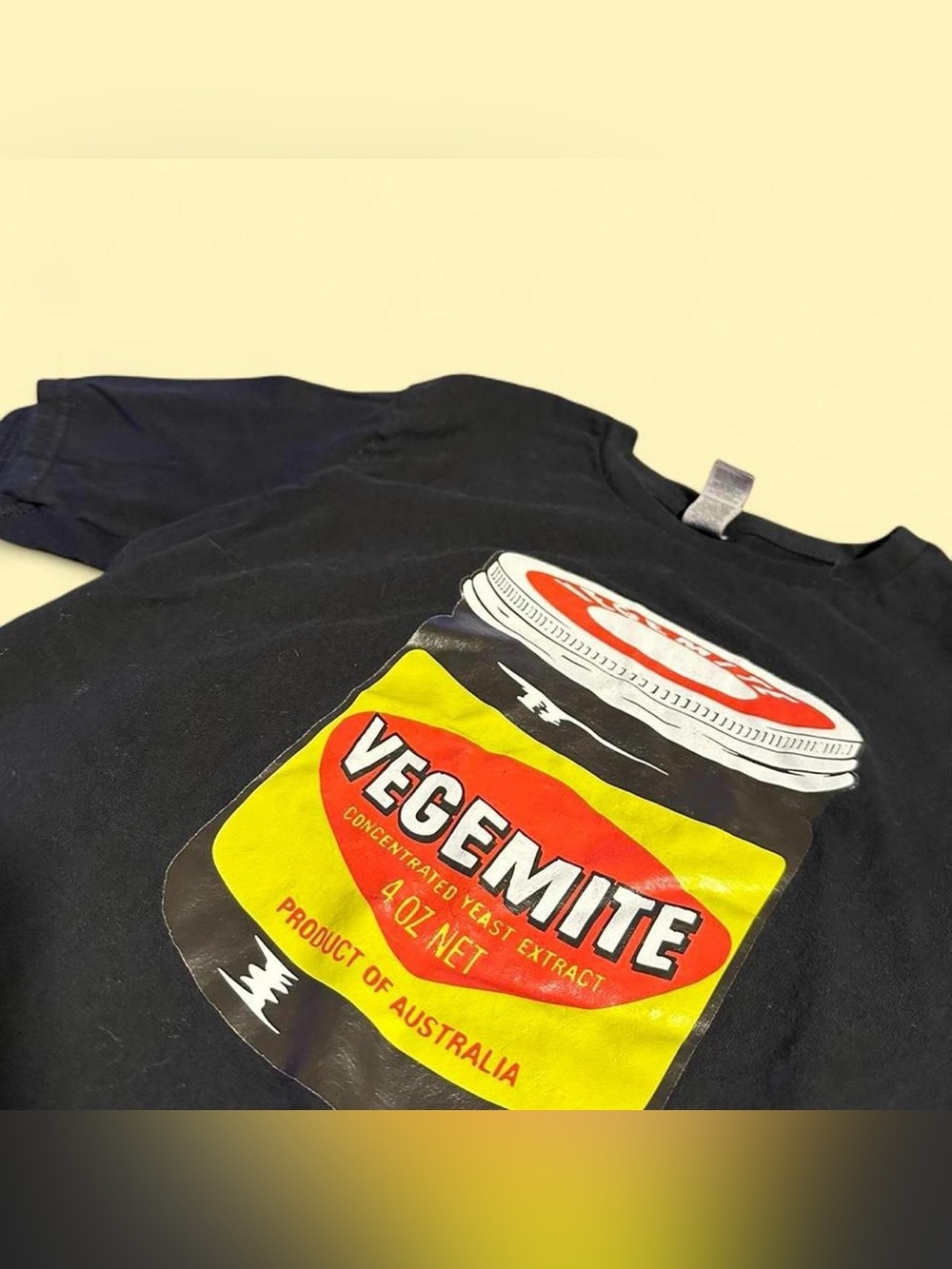 Retro Vegemite black t-shirt from an Australian cafe
Size S